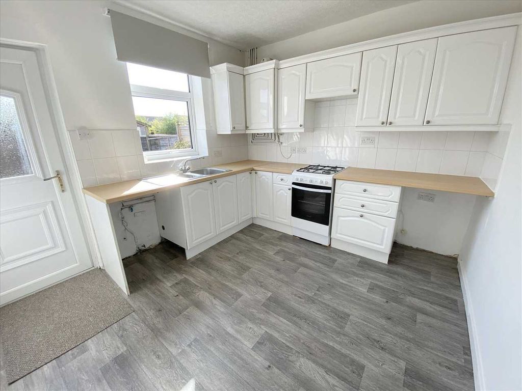 Property photo 3 of 12 Dining Kitchen: