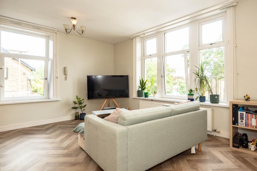 Property photo 2 of 11 Living Room: