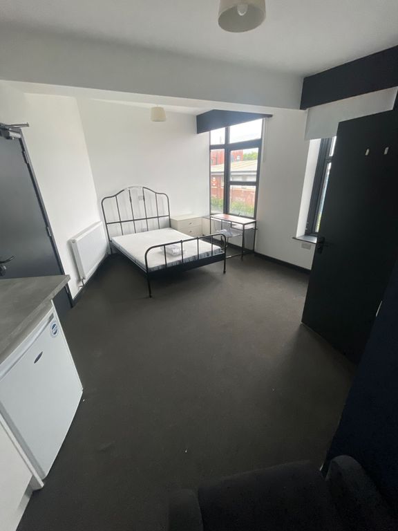 Property photo 3 of 4 Bright Double Bedroom Featuring Large Windows That...
