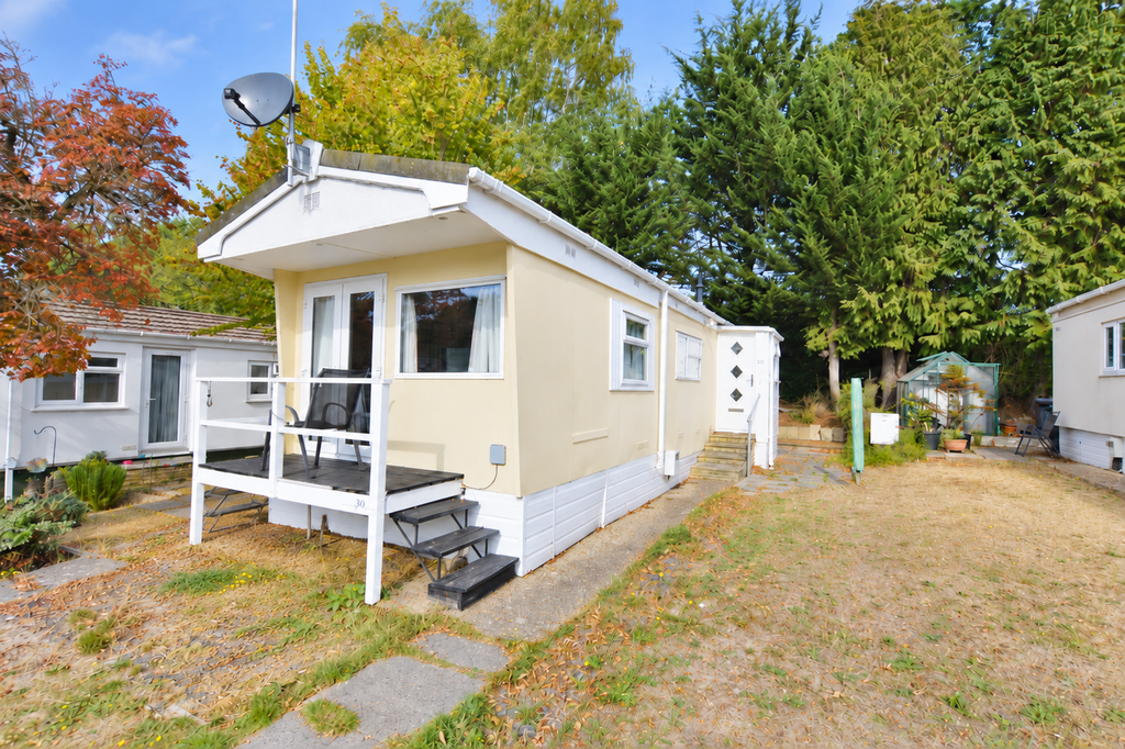 Property photo 1 of 7 Bright Mobile Home Garden Exterior