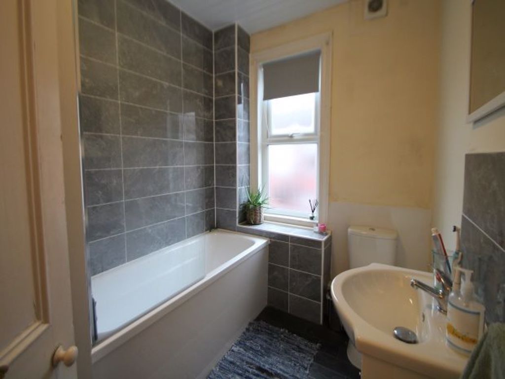 Property photo 3 of 7 A Bright And Well-Maintained Bathroom Featuring A ...