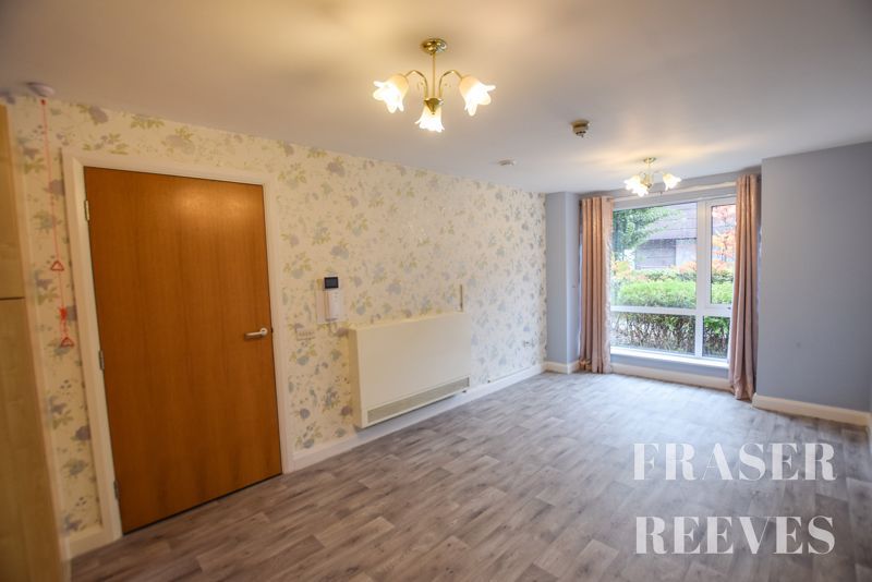 Property photo 2 of 11 Living Area