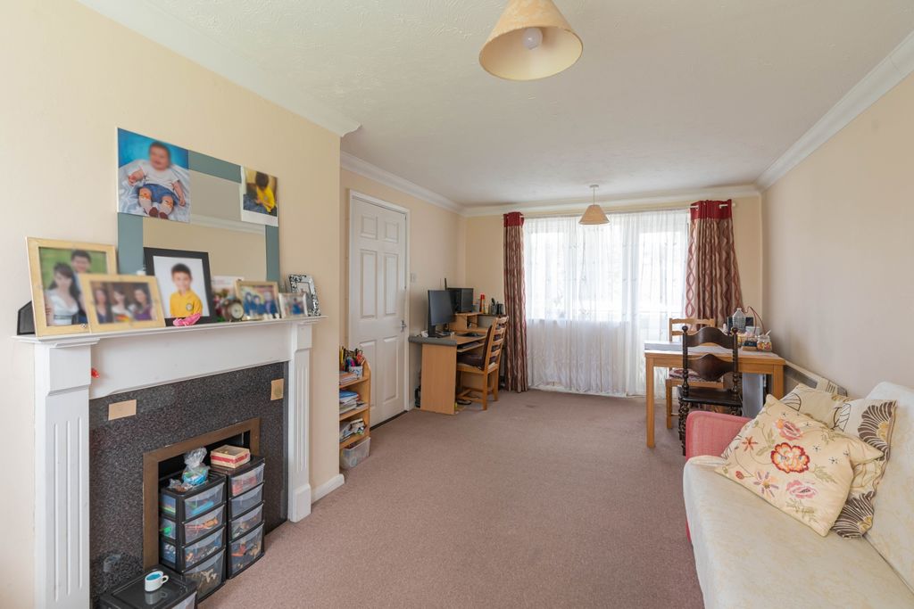 Property photo 3 of 12 Living Area