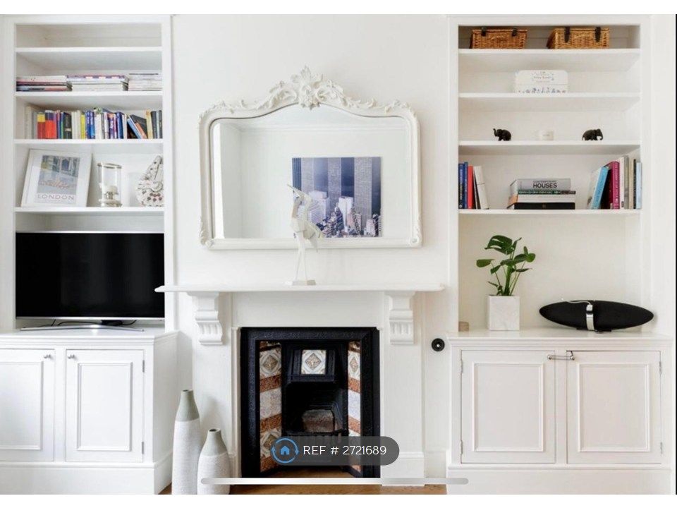 Property photo 2 of 16 Traditional Fireplace With Alcove Storage