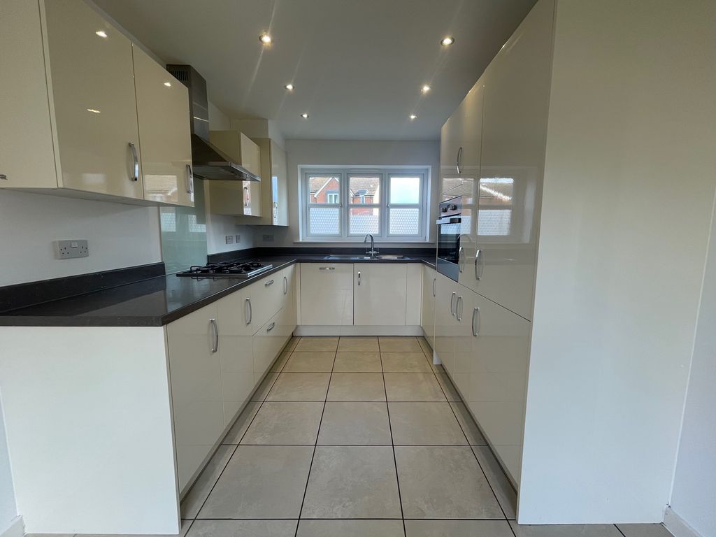 Property photo 3 of 13 Kitchen