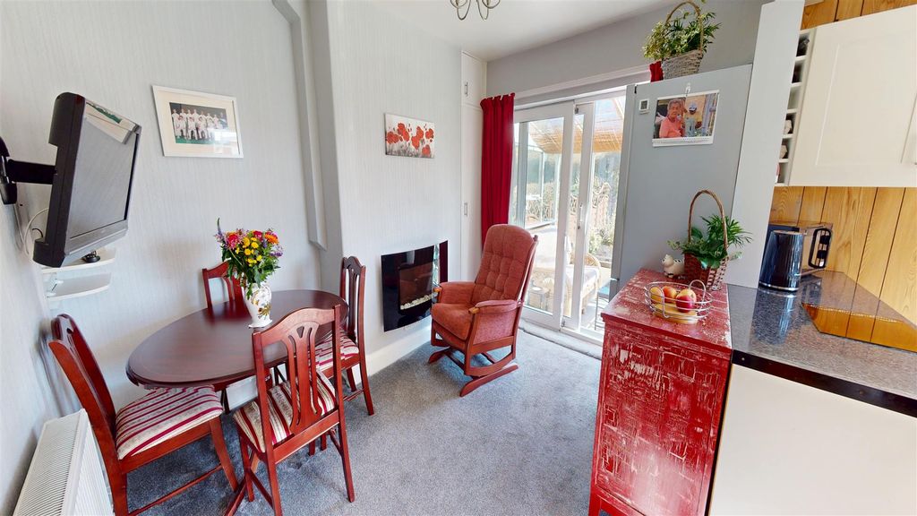 Property photo 3 of 13 Dining Kitchen