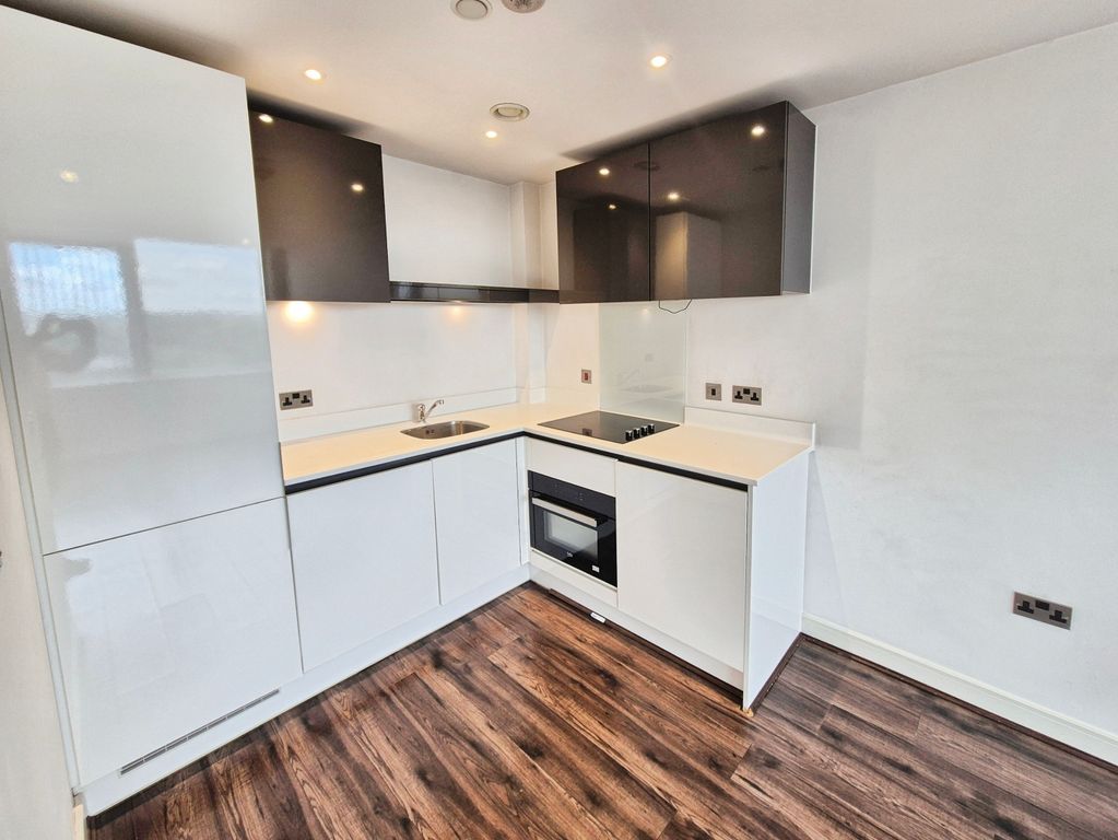 Property photo 3 of 9 Kitchen Area