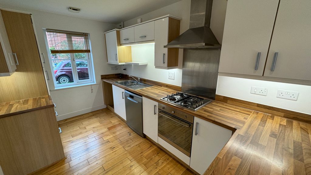 Property photo 2 of 17 Kitchen Area
