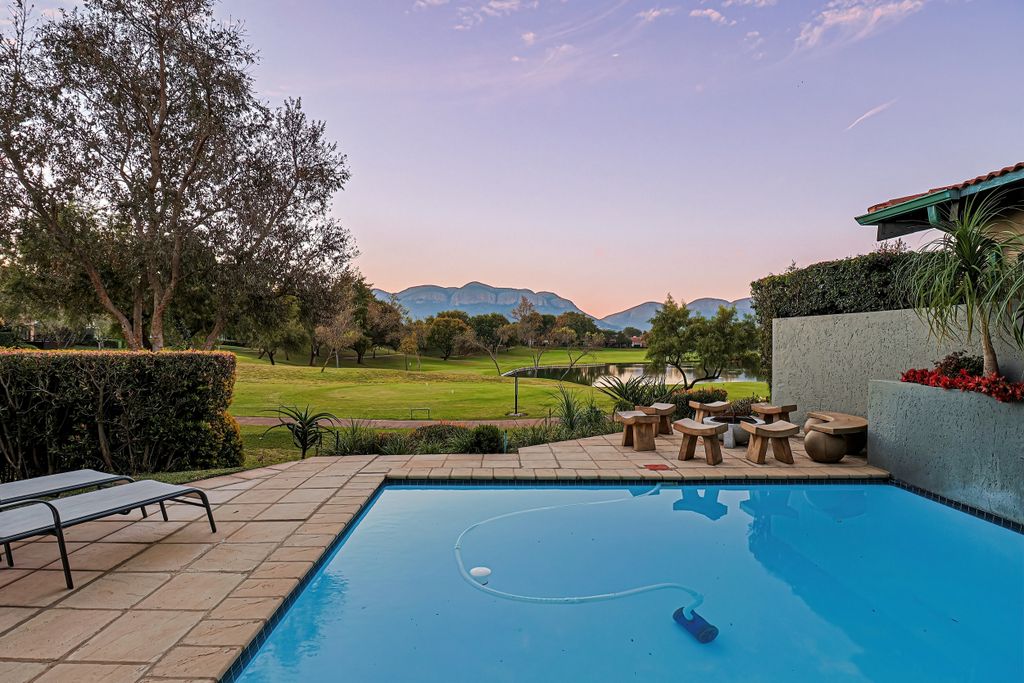 Property photo 2 of 57 View Over Pool From Patio