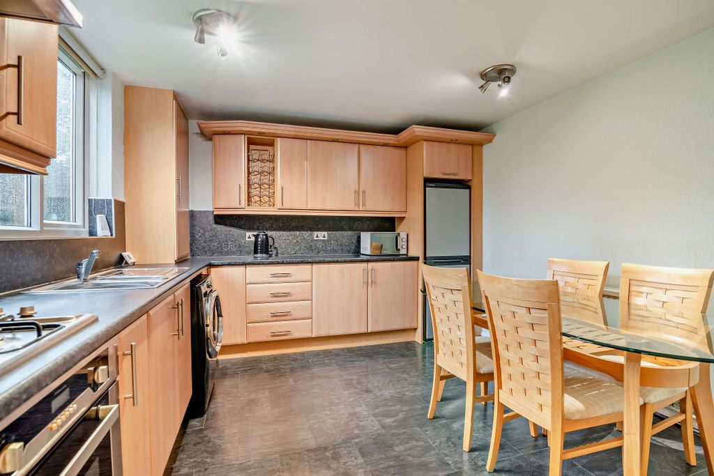 Property photo 2 of 13 Dining Kitchen