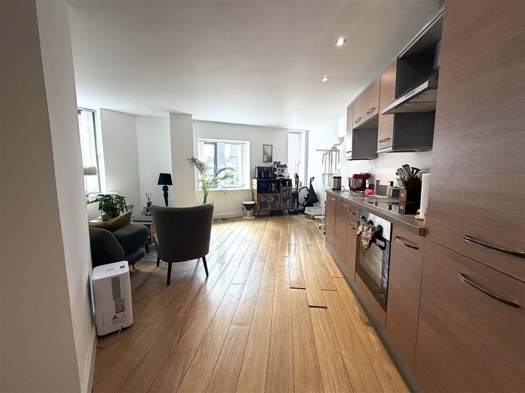 Property photo 3 of 10 Bright Open-Plan Kitchen With Modern Cabinetry...