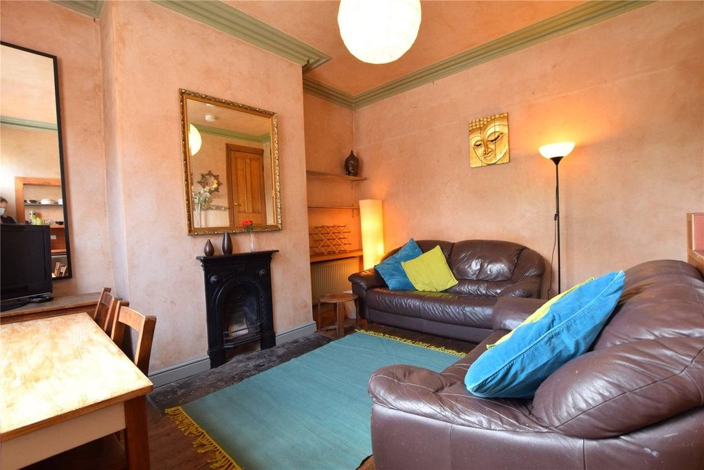 Property photo 3 of 9 Cozy Living Room Featuring Comfortable Leather Sof...