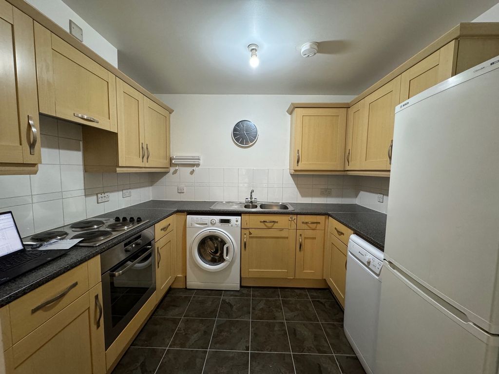 Property photo 3 of 8 Kitchen