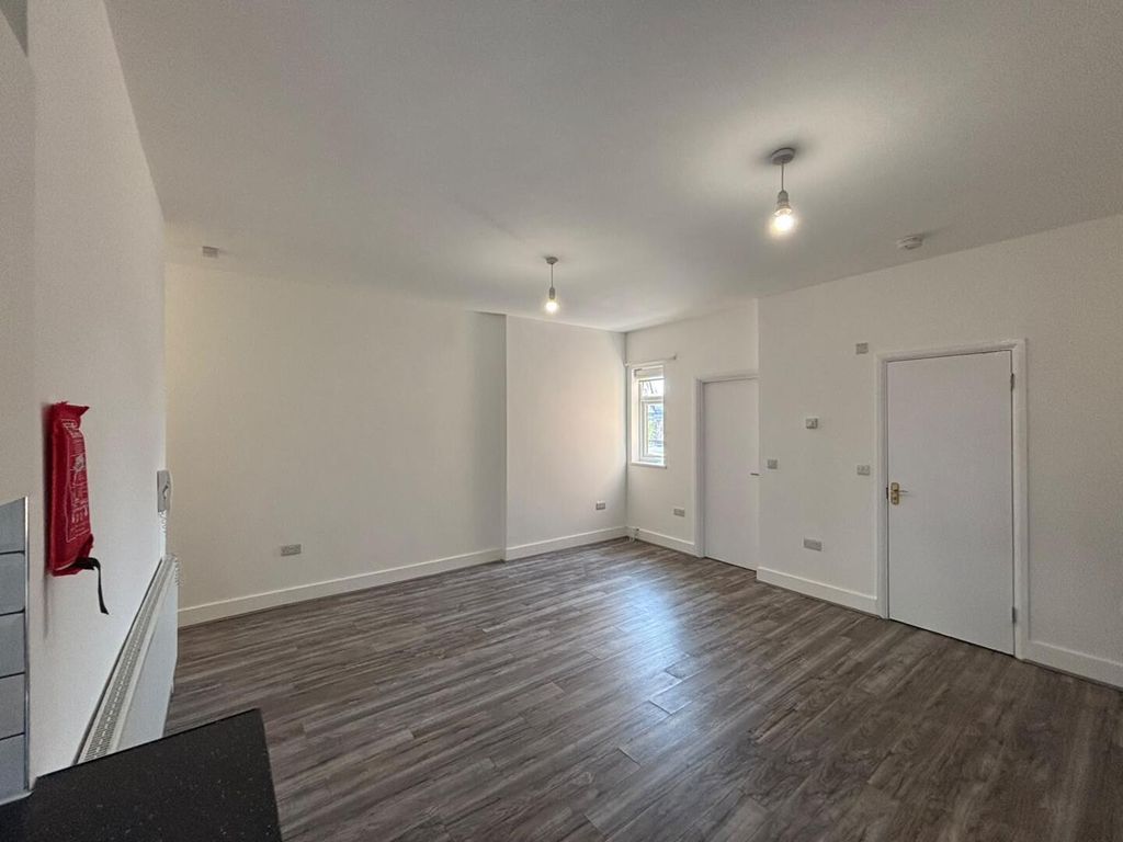 Property photo 3 of 8 Living Room