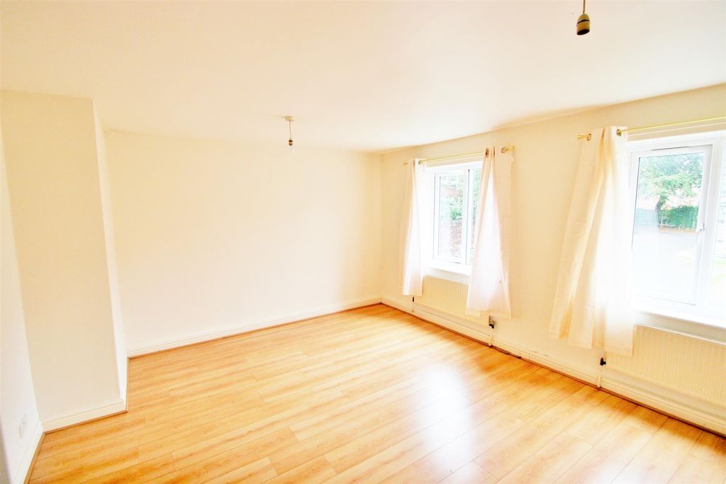 Property photo 2 of 6 A Bright And Airy Living Room With Large Windows A...