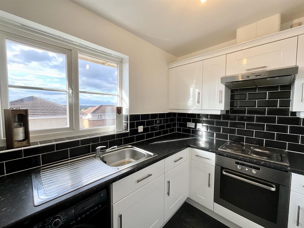 Property photo 2 of 12 Bright Modern Kitchen With Stylish Black Tiles...