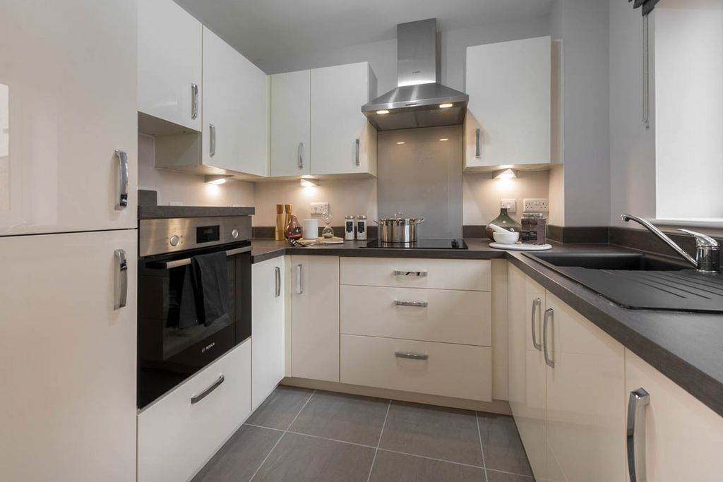Property photo 2 of 12 Typical Kitchen