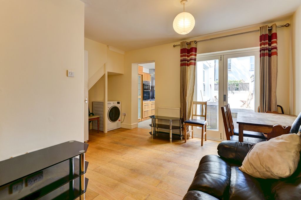 Property photo 1 of 29 A Bright And Inviting Living Room With Ample Natur...