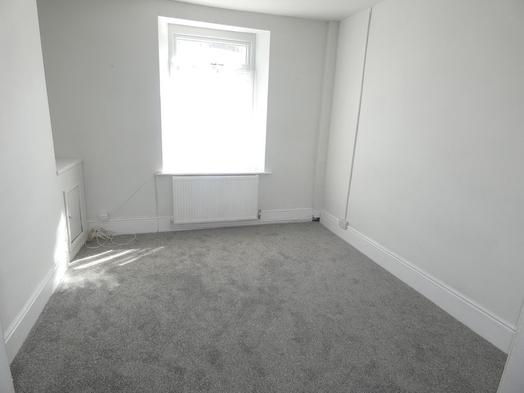 Property photo 3 of 12 Front Lounge