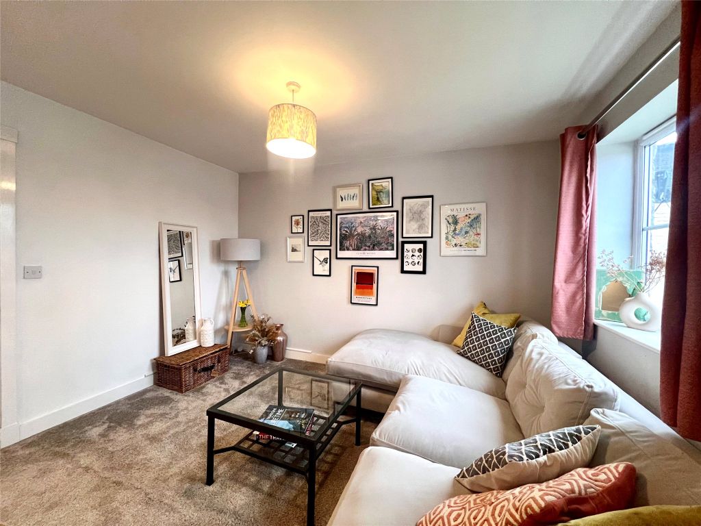 Property photo 2 of 12 Living Area