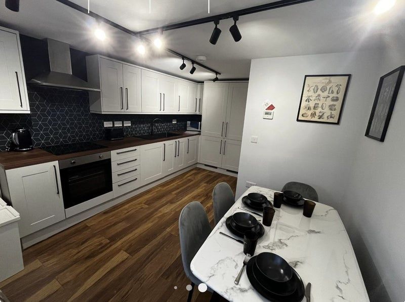 Property photo 3 of 16 Modern Fitted Kitchen With Long Run Of White Cabin...