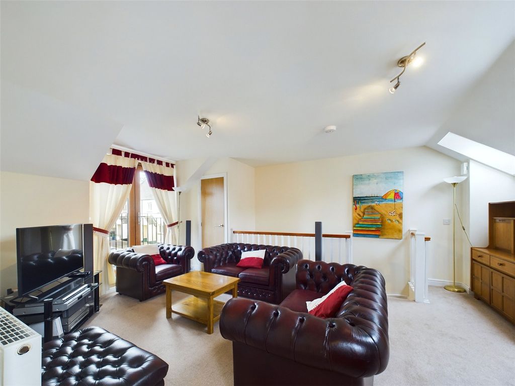 Property photo 3 of 13 Living Area