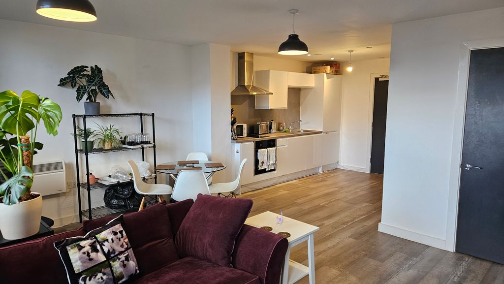 Property photo 1 of 6 Kitchen Living