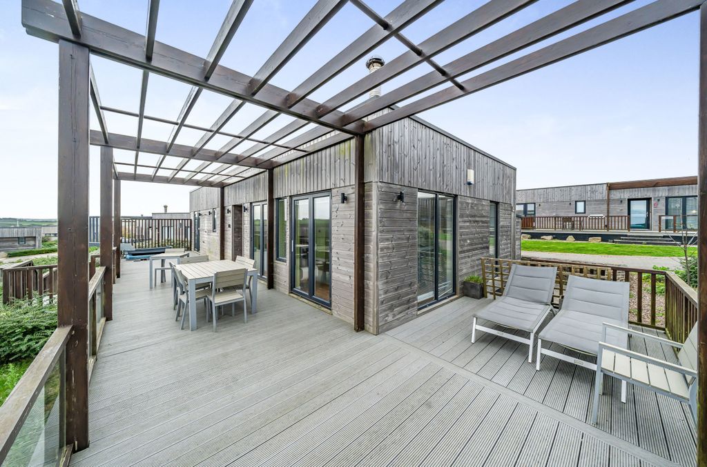 Property photo 2 of 22 Deck With Pergola