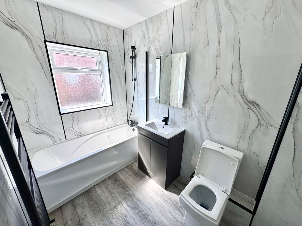 Property photo 2 of 6 Modern Bathroom