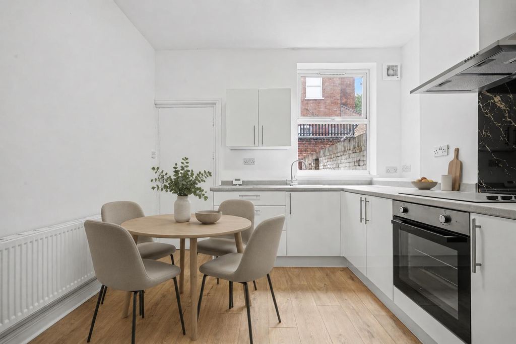 Property photo 3 of 20 Dining Kitchen Ai.Png