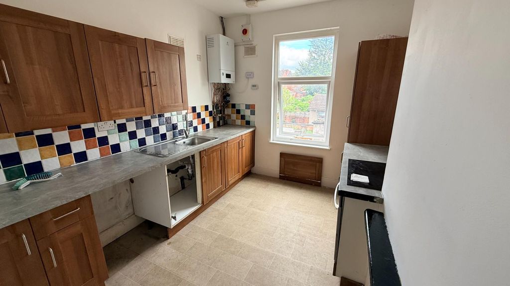 Property photo 2 of 7 Kitchen