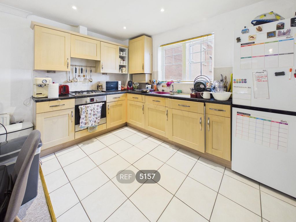 Property photo 2 of 9 Kitchen/Living Area