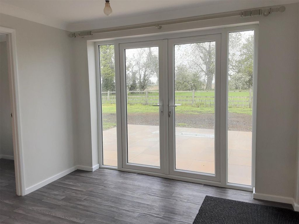 Property photo 3 of 10 Sun Room