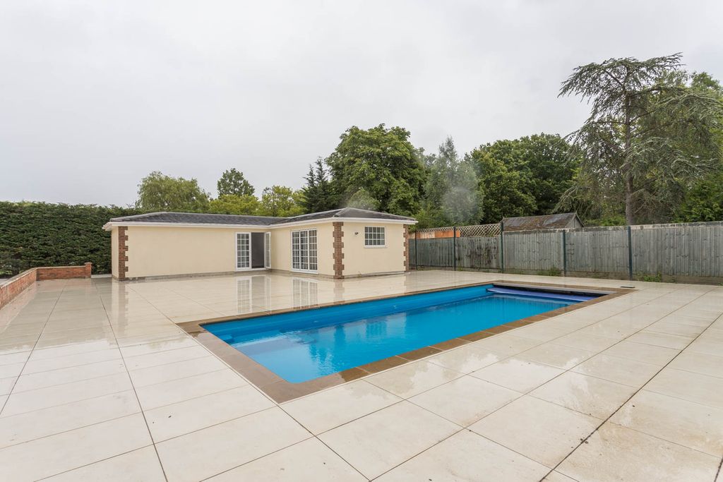 Property photo 2 of 31 Swimming Pool With Large Paved Patio Area