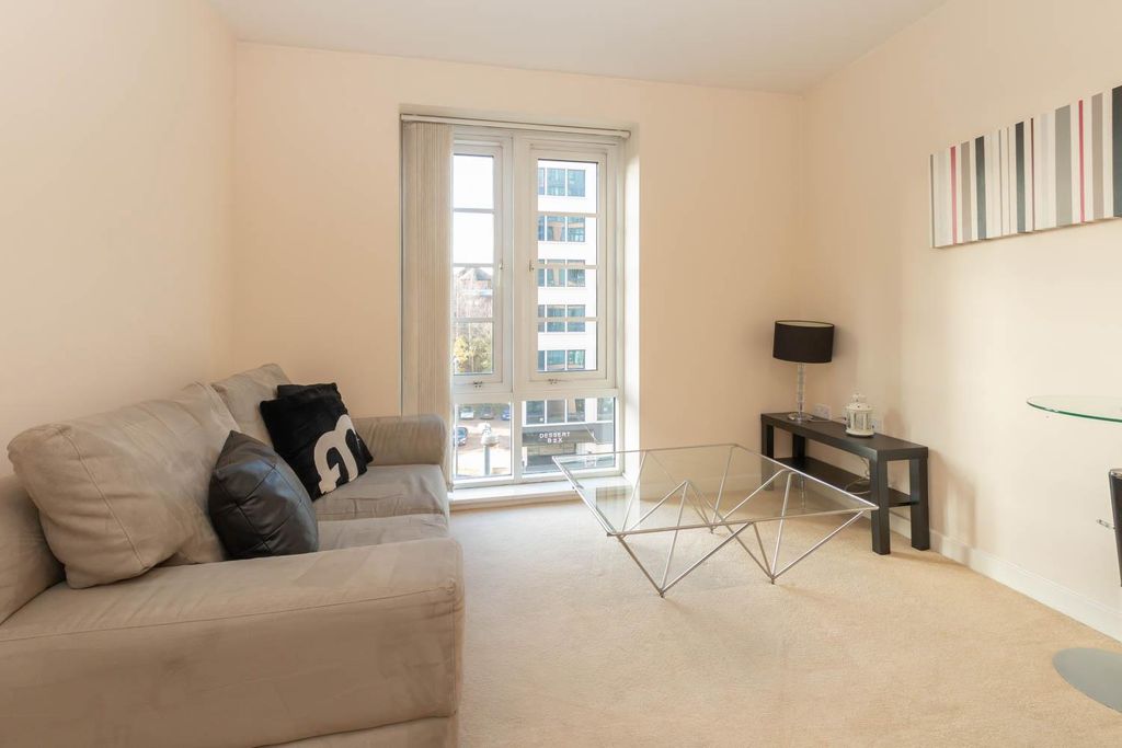 Property photo 1 of 8 Living Area
