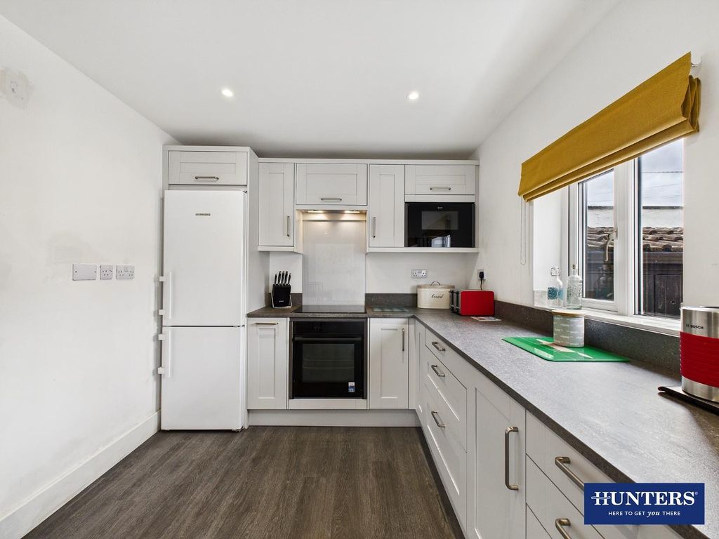 Property photo 3 of 17 Dining Kitchen