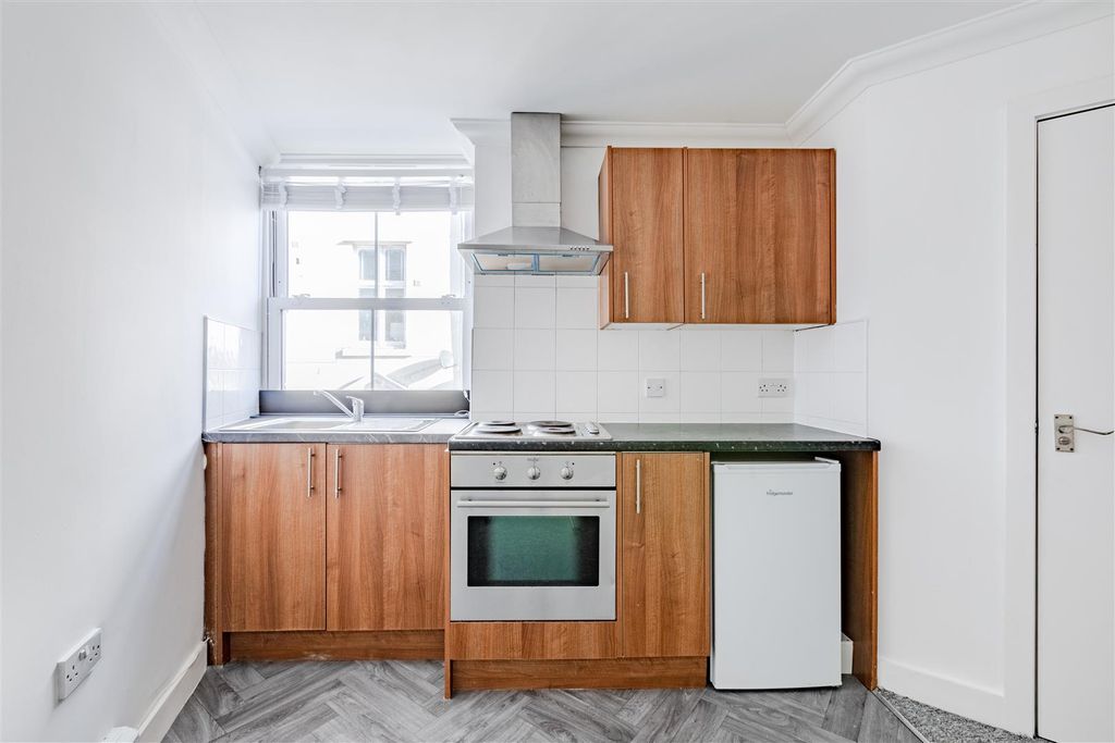 Property photo 3 of 5 Kitchen Area