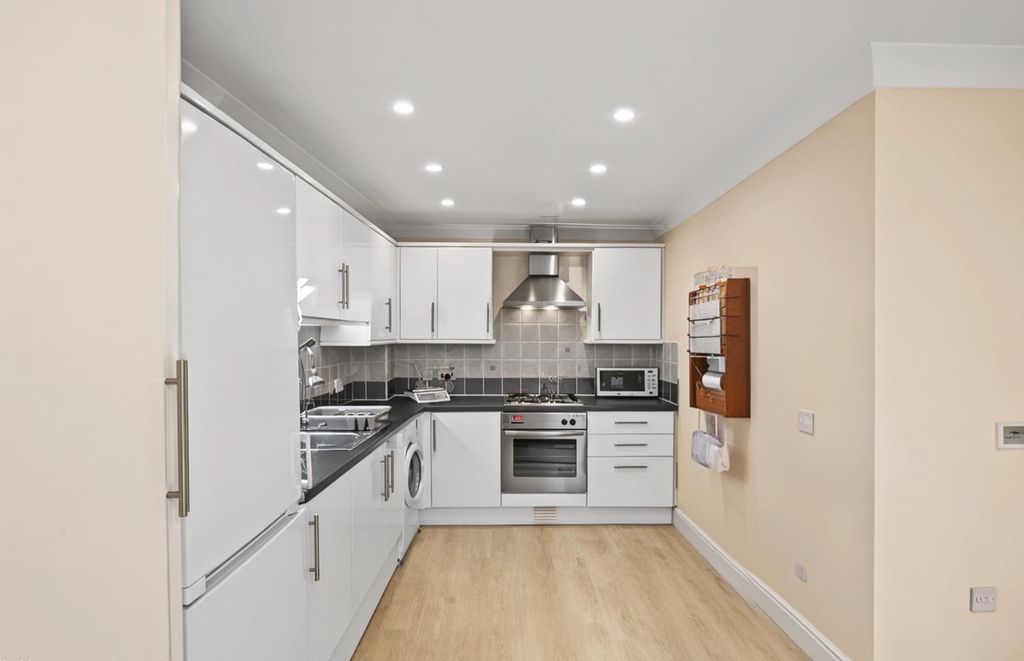 Property photo 2 of 12 Kitchen