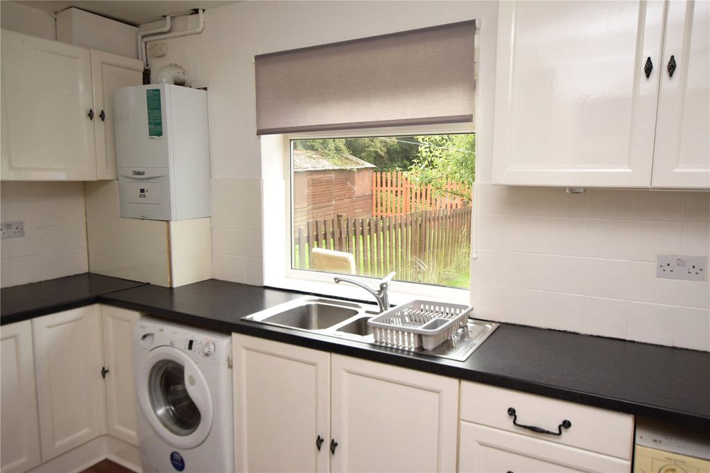 Property photo 3 of 13 Kitchen