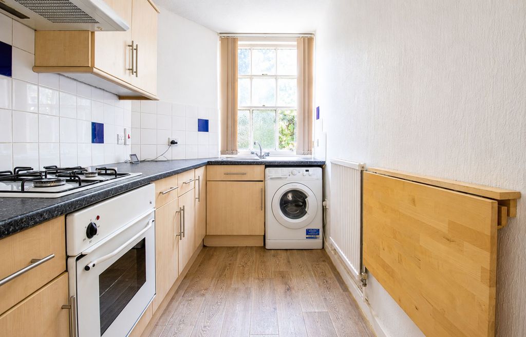Property photo 3 of 7 Kitchen