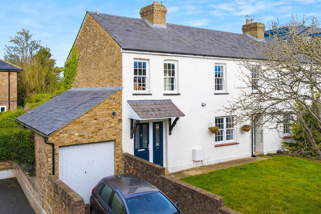 Property photo 1 of 19 Suburban Homes Under Clear Skies.Png