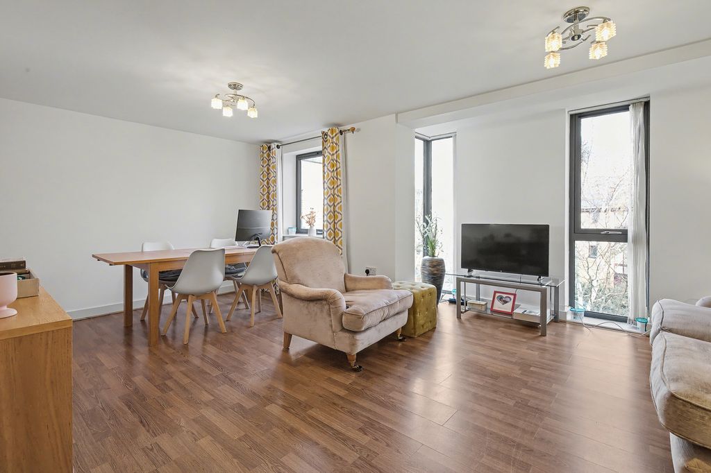 Property photo 3 of 12 Living Area - Angle 3