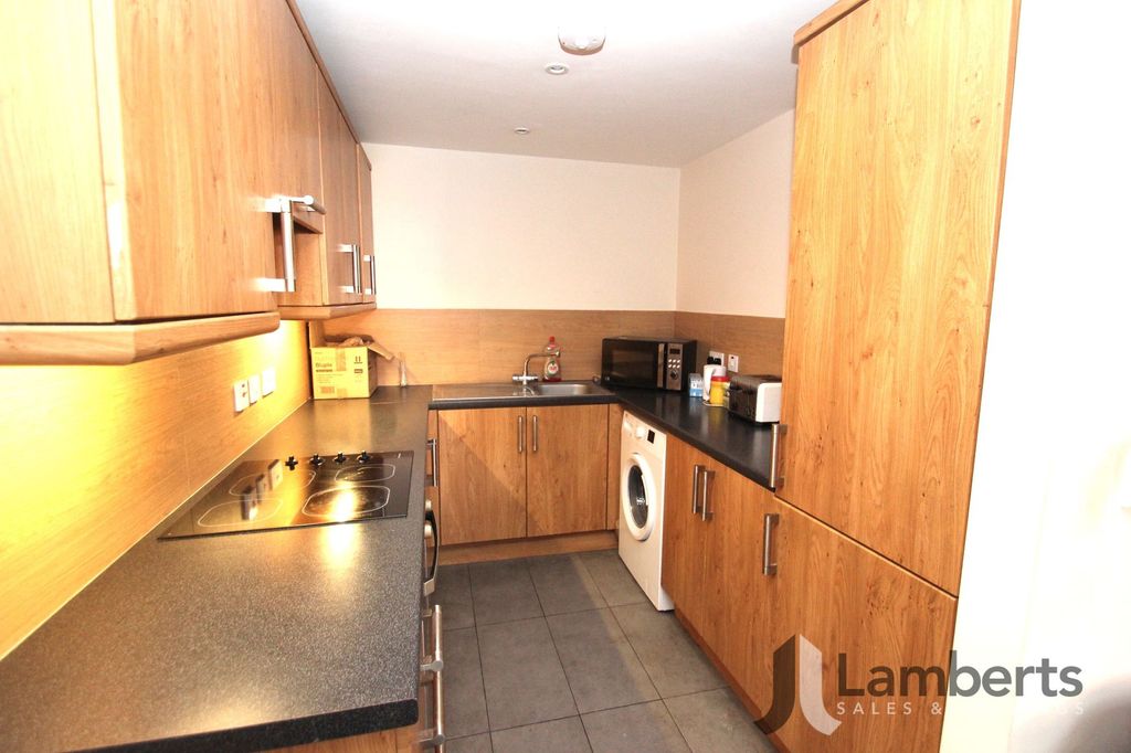 Property photo 3 of 12 Kitchen