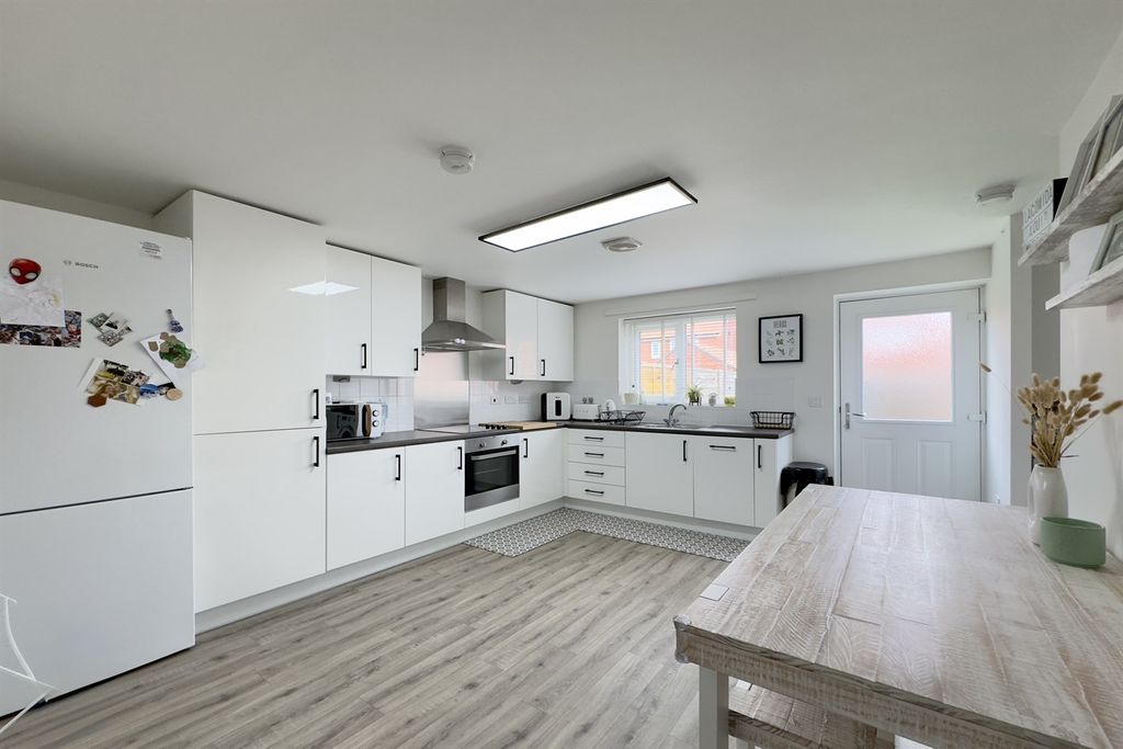 Property photo 3 of 13 Dining Kitchen
