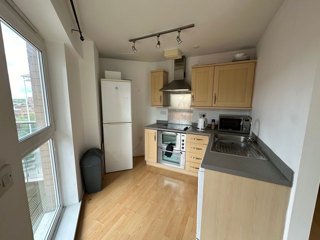 Property photo 3 of 9 Kitchen