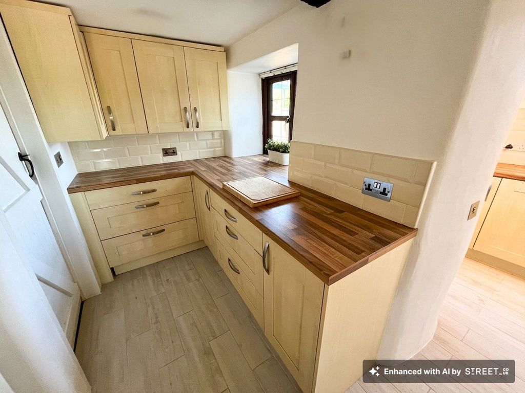 Property photo 3 of 27 Kitchen