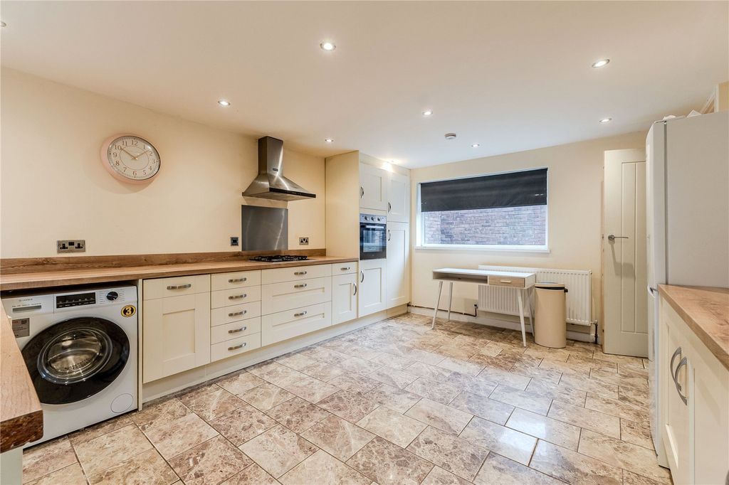 Property photo 3 of 13 Dining Kitchen
