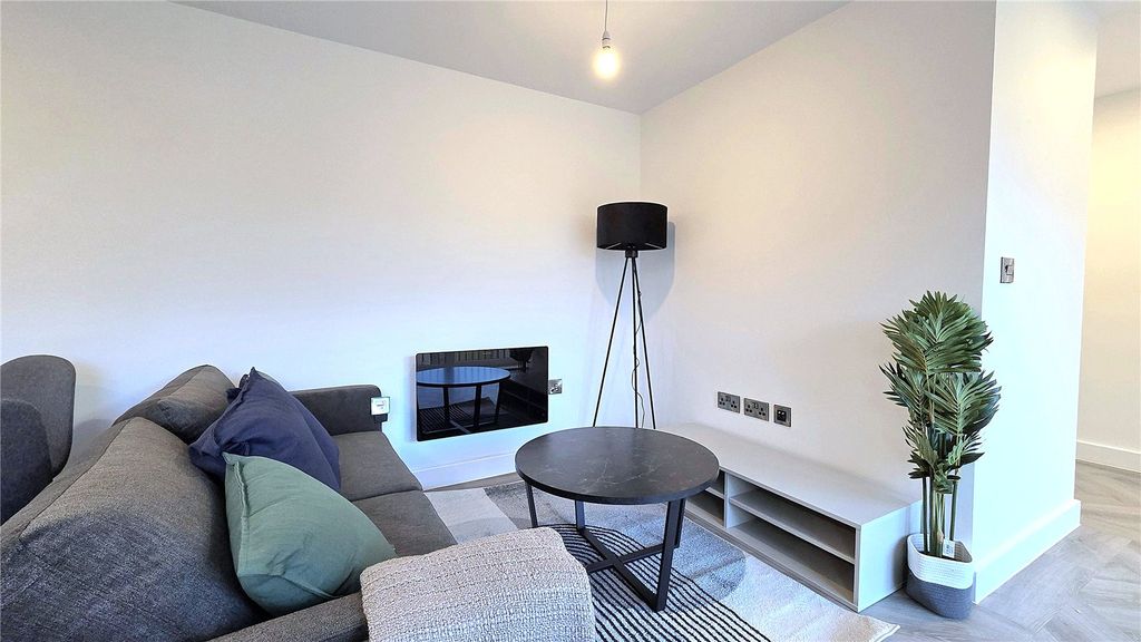 Property photo 3 of 8 Living Area