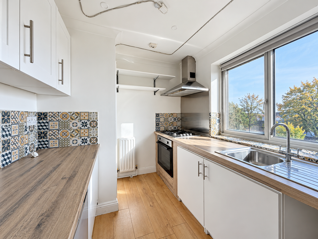 Property photo 3 of 6 Bright Modern Galley Kitchen With Patterned Tiles