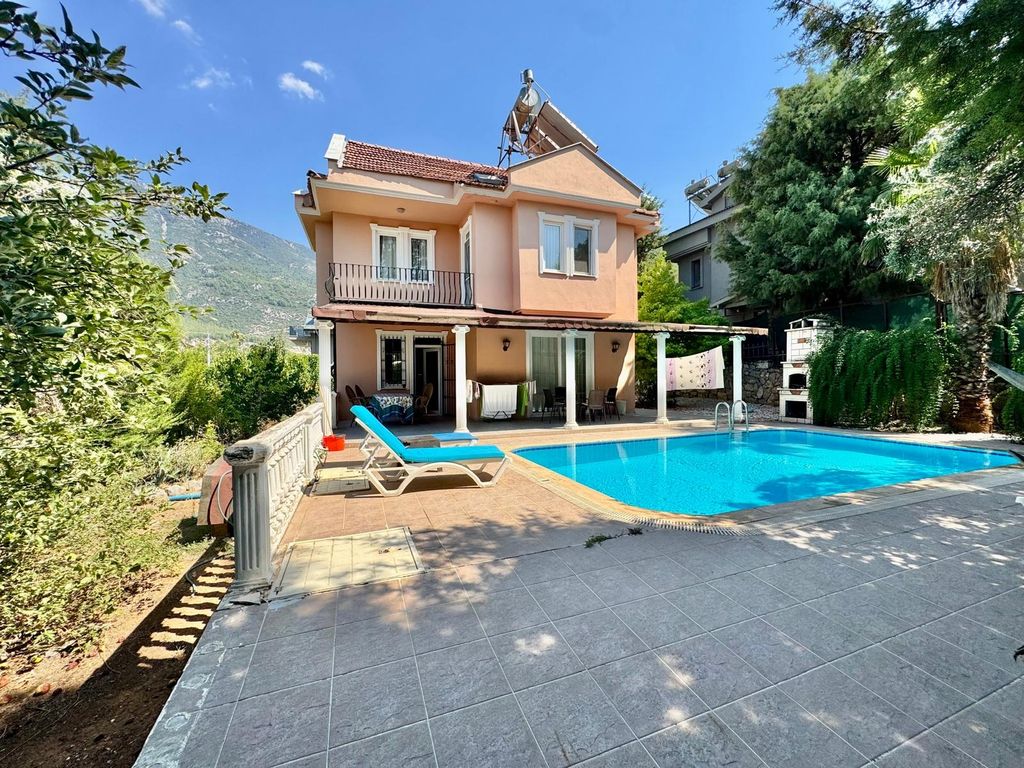 Property photo 2 of 24 Charming Detached Fethiye Property For Sale - Main View Of The Beautiful Villa And Garden